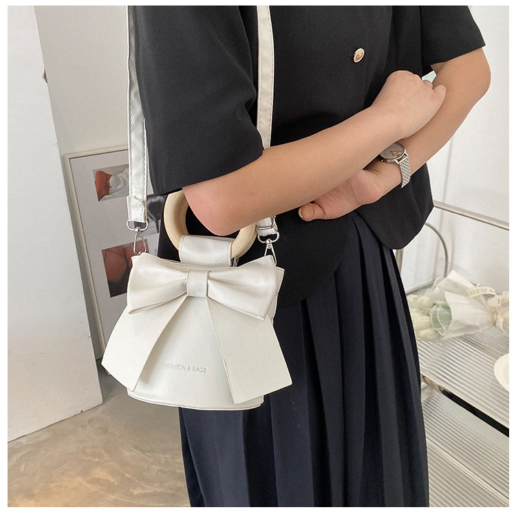 455g Weight Synthetic Leather Lining Material Sewing Thread Fashion Element Magnetic Buckle Closure Type Single Shoulder Strap, Double Handle Strap Type Bucket Bag Bags Type Casual Occasion Pu Leather Material Bow Knot Pattern All Seasons Season Women's Gender Elegant Style Bucket Shape Small Size Women's Small Pu Leather Bow Knot Elegant Sewing Thread Bucket Magnetic Buckle Bucket Bag 14