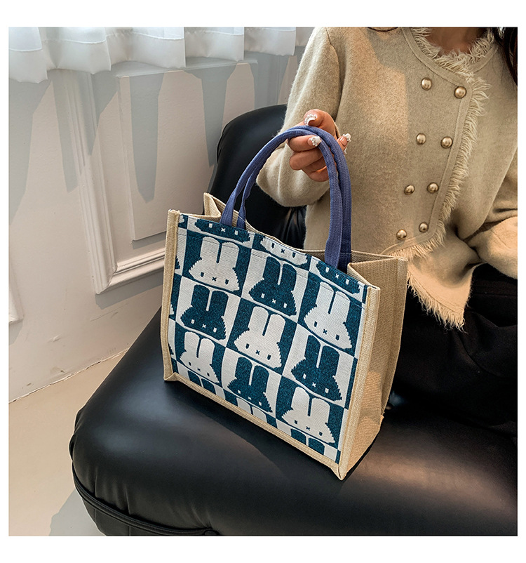 High-end mid-capacity canvas school commuting handbag 2024 new style fashionable and versatile linen single-shoulder tote bag undefined