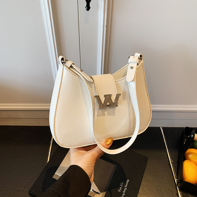 Bolso de alta calidad con textura 2025 verano nuevo bolso femenino con letras de diamantes bolso de hombro charol brillante bolso de mensajero marea