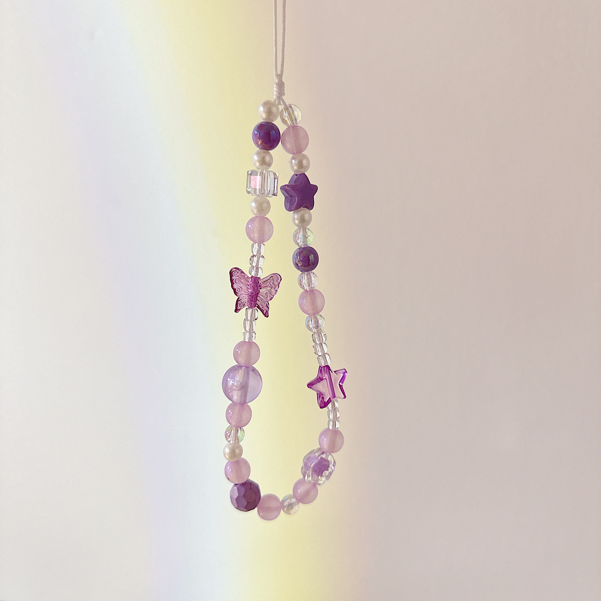 Cadena aplicable nicho mariposa corta cadena de muñeca arco cuentas de caso de teléfono móvil colgante tipo correa de muñeca anti-pérdida