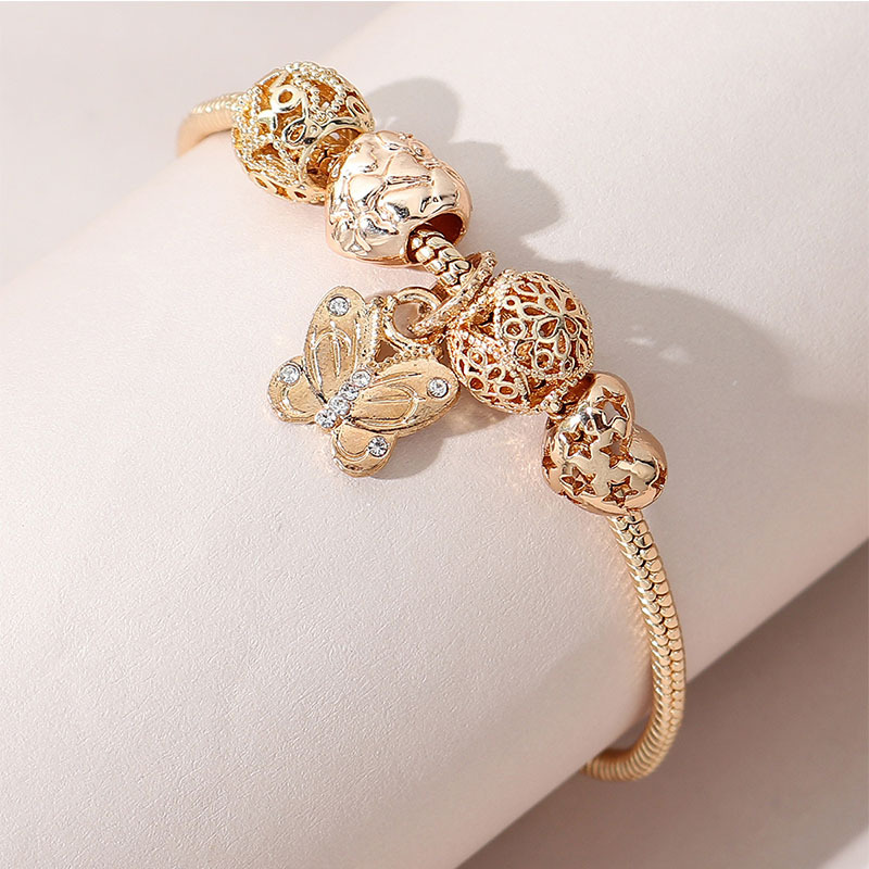Panjia pulsera Dora DIY cuentas transfronterizas explosión ajustable aleación de mariposa en forma de corazón colgante de diamante pulsera de cobre