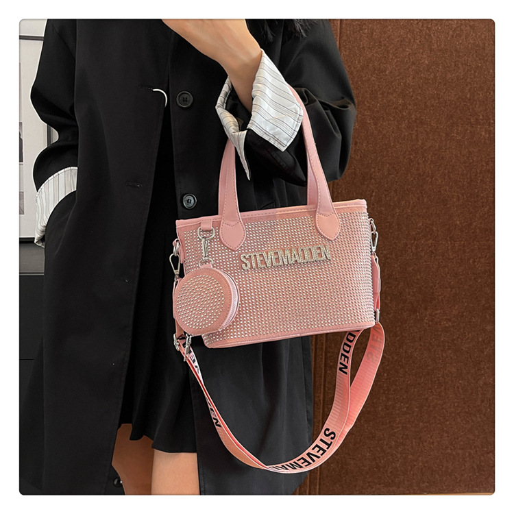 Bolso de letras de diamantes de imitación transfronterizos diseño de nicho femenino moda simple portátil popular 2025 nueva textura bolsa de mensajero