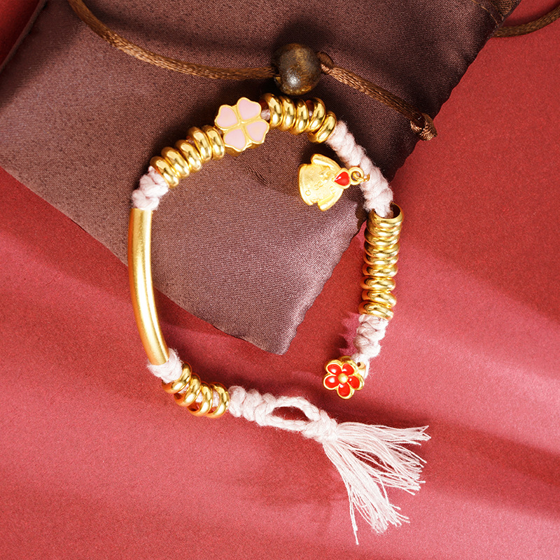 Brazalete de flores de cuatro hojas de oro vietnamita estilo nacional bordilla curva brazalete no se desvanecerá joyas de mano al por mayor transfronterizo