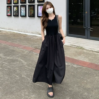 黑色吊带连衣裙女法式赫本风2026夏季新款显瘦无袖高级感长款裙子