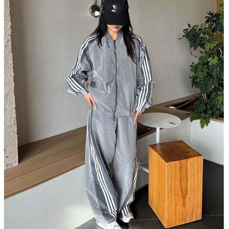 Cross-border fashion luminous stripe sports suit for women, spring and autumn cardigan jacket and wide-leg pants casual two-piece set, European and American style Cross-border fashion luminous stripe sports suit for women, spring and autumn cardigan jacket and wide-leg pants casual two-piece set, European and American style