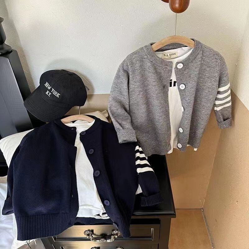 Thin autumn children's cardigan for boys with a round collar