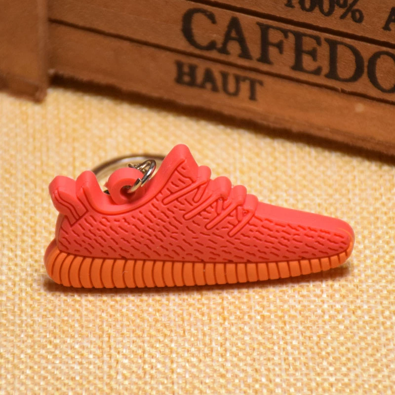 Keychain Adi 3D sneaker, soft PVC mini shoe charm, 8 × 4 × 2 cm, lightweight