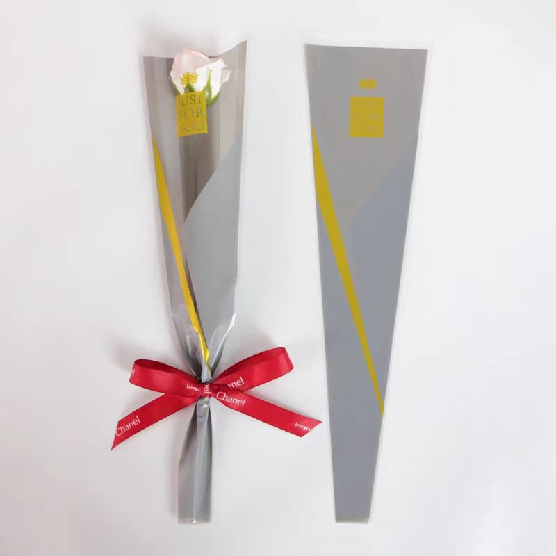 Fábrica en stock al por mayor Sansheng línea única flor paquete bolsa Rosa bolsa de embalaje flor material de embalaje floral DIY bolsa