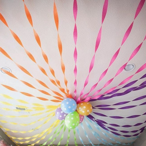 Colorful crepe paper roll with folds, handmade wedding party birthday party background decoration, flower paper streamers