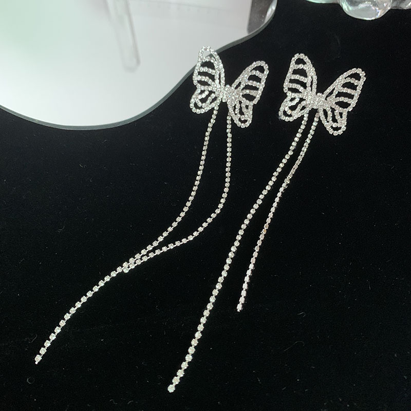 Nihaojewelry Fashion Hollow Butterfly Long Tassel Copper Earrings Wholesale Jewelry display picture 5