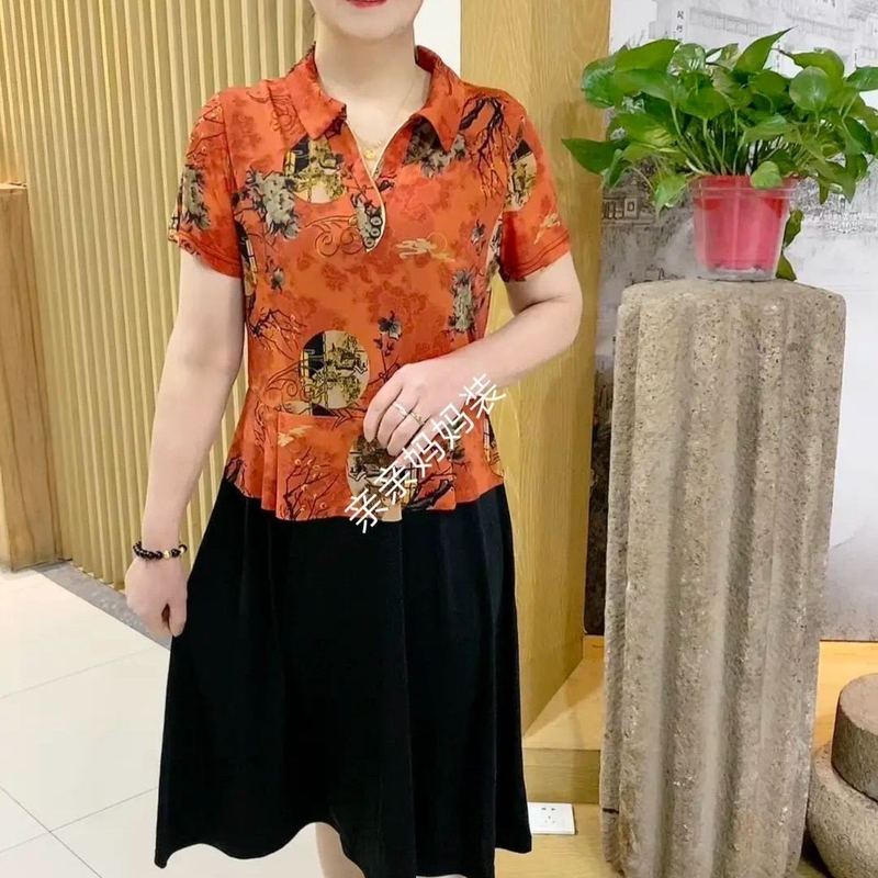 夏の新型のお母さんのファッションの洋気は肉を遮ってやせています。|undefined