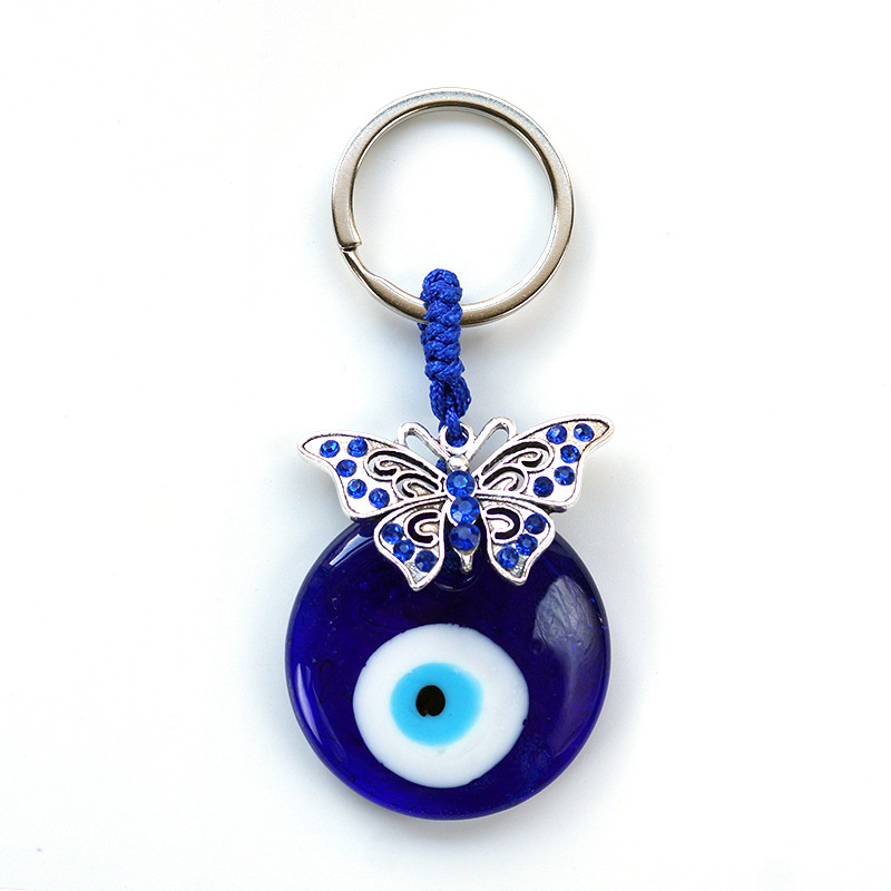 Cruz De La Frontera estilo turco griego ojos azules colgante llavero colgante de diamante incrustado ojo oblicuo joyería del ojo del diablo al por mayor