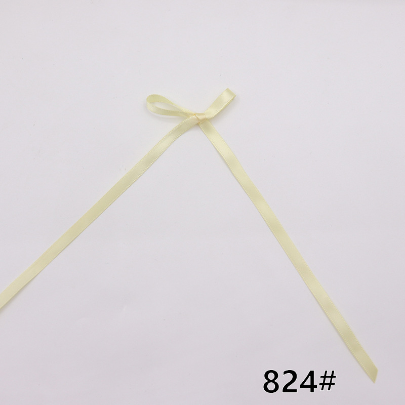 現物の0.6センチの幅の長いリボンの蝶結びの諸及びネットの赤い靴下の蝶結びの部品の服装の補助材料|undefined