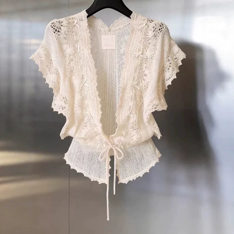 The Boutique Has Withdrawn the Spring-Summer French Lace Cardigan Top, Which Features a Versatile Design, Slimming Effect, Bow Tie, and a Fashionable and Stylish Look The Boutique Has Withdrawn the Spring-Summer French Lace Cardigan Top, Which Features a Versatile Design, Slimming Effect, Bow Tie, and a Fashionable and Stylish Look