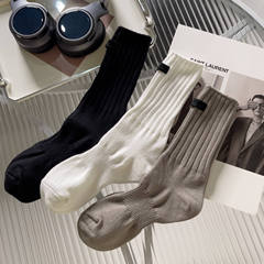 New solid color retro autumn and winter thick line pile socks with waist and vertical strips for men and women, medium and long tube pile socks