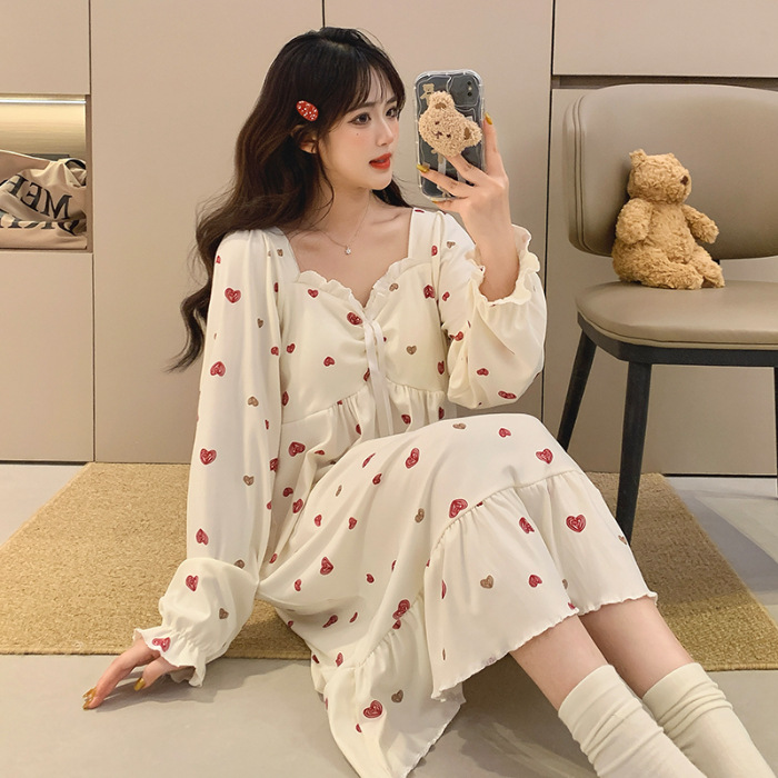 Fábrica directa con cojín de pecho desmontable de ternilla pijama de manga larga primavera y otoño estilo coreano chaqueta dulce ropa larga para el hogar