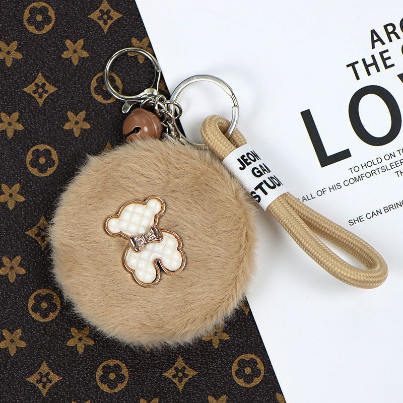 Luz de lujo pequeño viento de peluche colgante espejo bolso colgante espejo de maquillaje llavero plegable con espejo de doble cara a prueba de pérdida