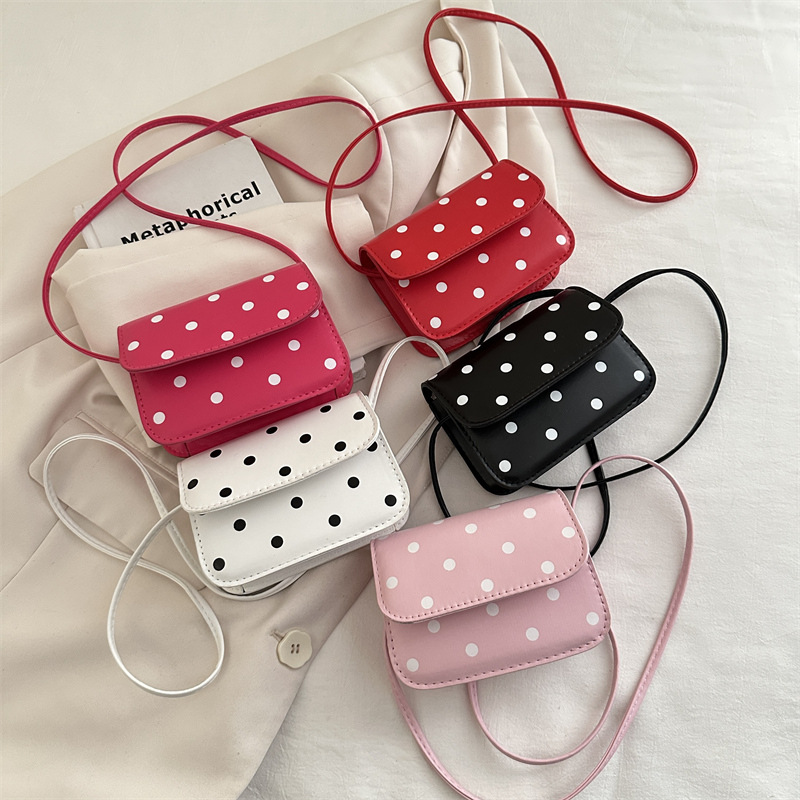 2025 primavera nuevo estilo estilo estilo extranjero simple mochila puede amar la bolsa de princesa de color ondulado punto de cambio bolsa pequeña