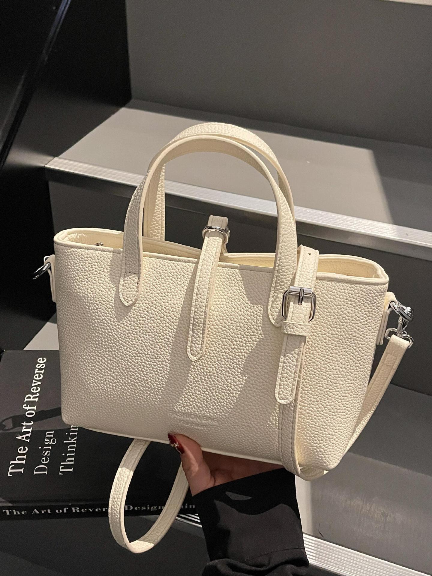 Bolso de mano simple de comercio exterior para mujer 2025 nuevo bolso de hombro de color sólido de todo fósforo bolso de mensajero de textura de moda popular