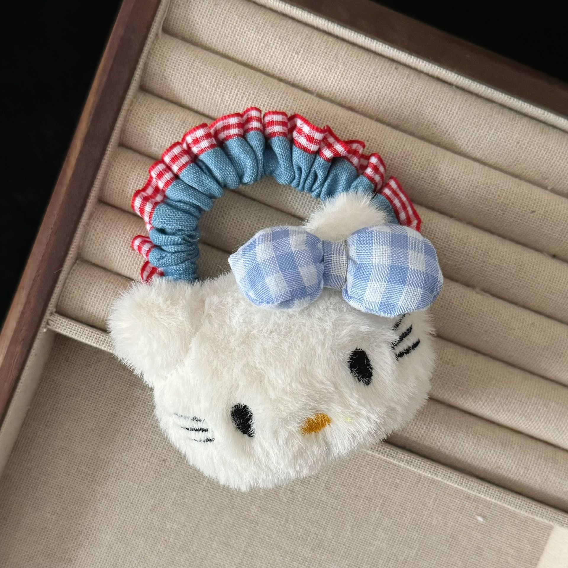 Blue plaid cat hair tie