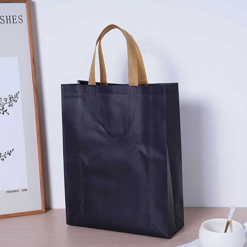 Exposición publicitaria bolsa de mano no tejida instituciones de capacitación bolsa de protección ambiental logotipo de impresión bolsa de película no tejida fija