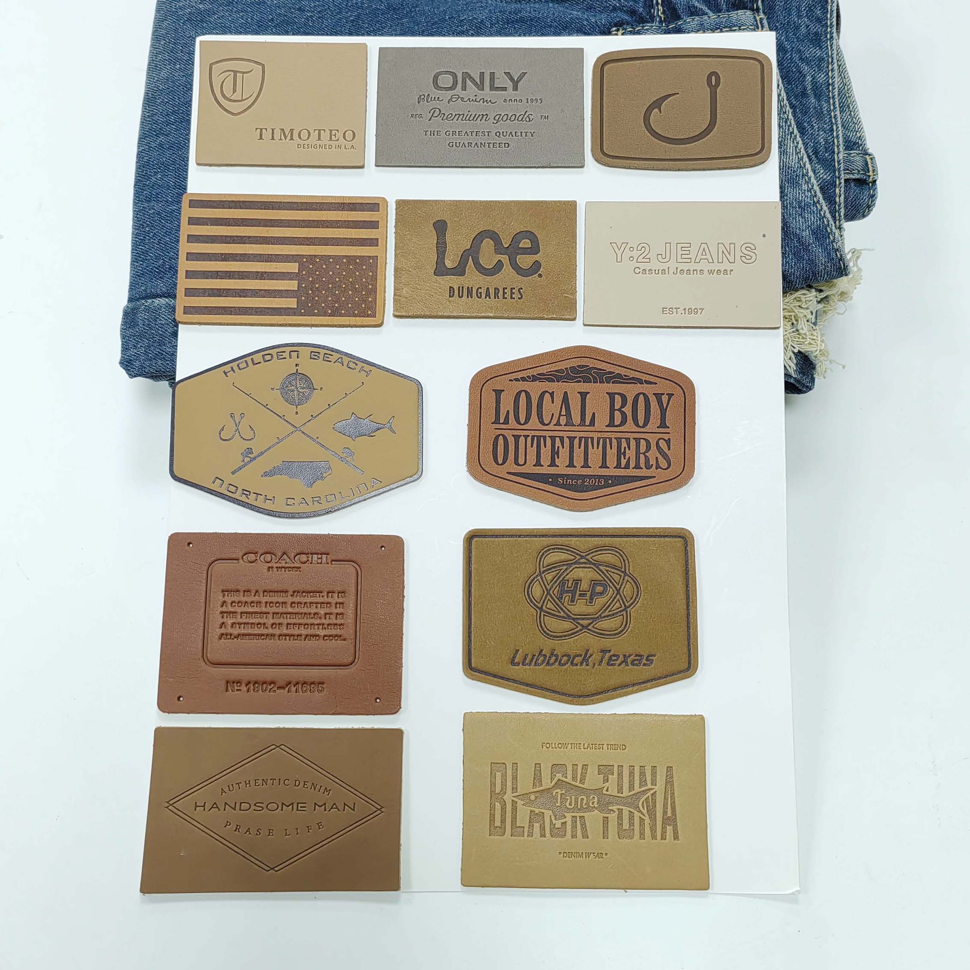 源头工厂皮牌 衣帽箱包商标配件压凹浮雕标签真皮皮标定 制