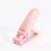 Fuchsia plastic eyelash curler