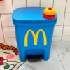 Blue garbage can, sticker, small bell
