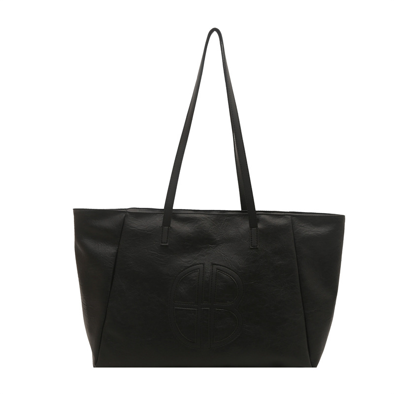 Bolso de mano de dama de alto nivel primavera y verano 2025 versátil bolso de viaje en bolsa popular de gran capacidad este año