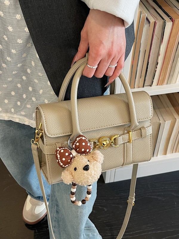 Alta textura de hardware decoración bolso de mano mujer 2026 nuevo popular litchi pattern casual versátil mochila
