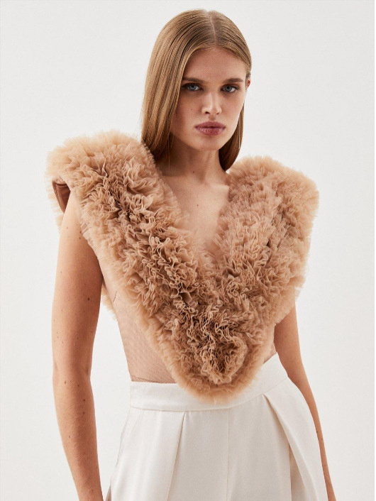 Europa y América Primavera/Verano Maillard Tops ajustados de alta gama Diseño femenino Cuello en v Tops de malla hinchada Estilo de temperamento de mujer image 1