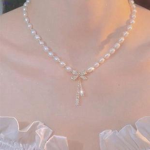 2025 New Bow Pearl Pendant Necklace Feminine Light Luxury Niche Design Clavicle Chain Elegant Necklace Chain