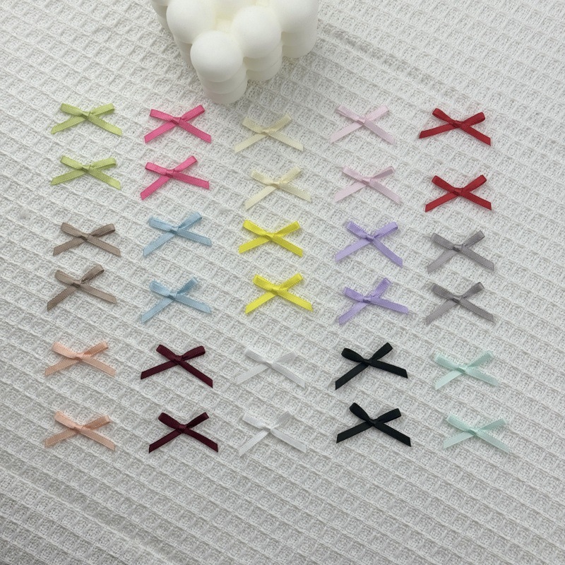 现货3mm丝带迷你蝴蝶结diy配饰服装辅料内衣袜子机打小蝴蝶结配件