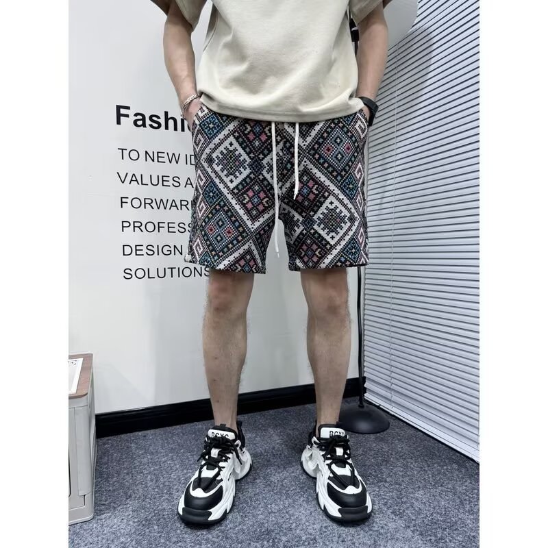 Nueva moda nacional delgada pantalones cortos jacquard de verano casual pantalones de quinta sueltos versátiles pantalones de playa de hombre