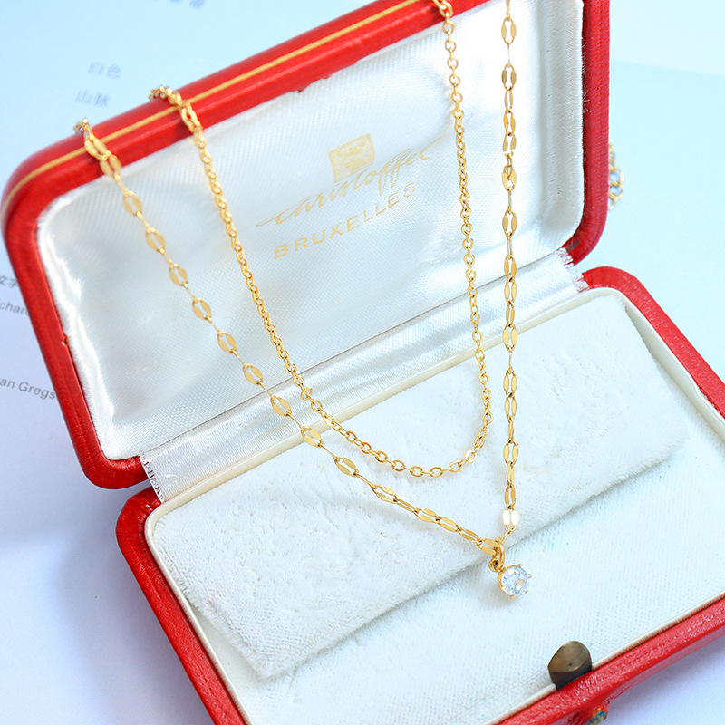 Estilo coreano ins diseño de nicho simple collar de circón apilado de doble capa collar de clavícula de acero de titanio para las mujeres