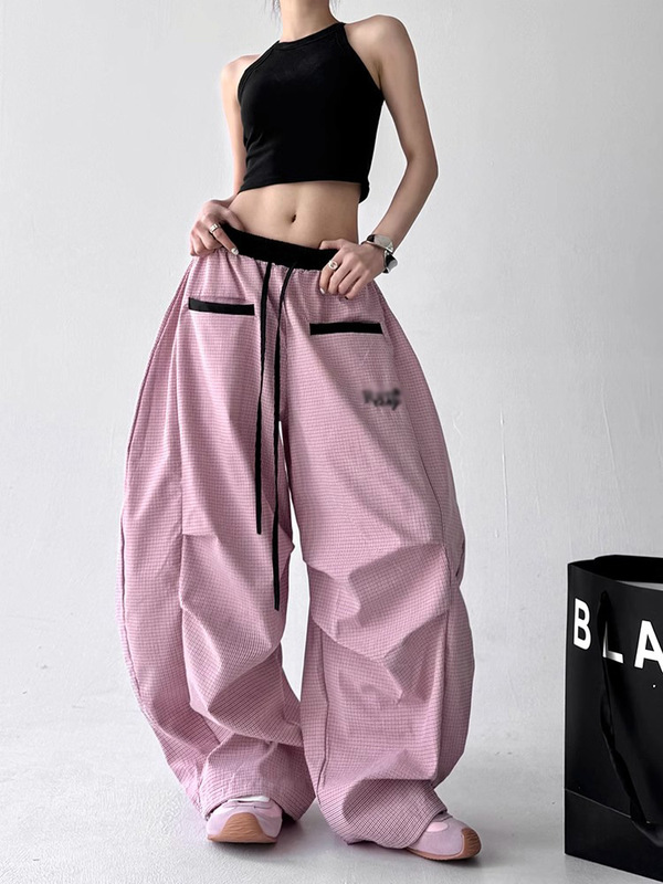 街頭のファッションブランドのストライプの曲がりくねったナイフのカジュアルなズボンの女性2025年の夏の新型の垂れ下がった感じがゆったりしています。|undefined