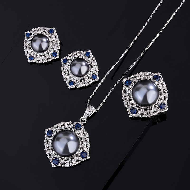Zhuang Sheng joyas de cobre inferior chapado en oro con incrustaciones de perlas fritillary coreano artificial azul tesoro color diamante incrustado temperamento gris cuentas traje