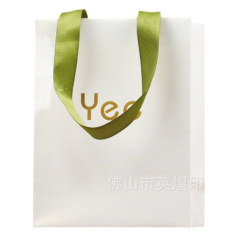 Высококачественный подарочный пакет бумажный мешок специальный бумажный магазин одежды ювелирный магазин может быть напечатан с логотипом производителя мешка на заказ