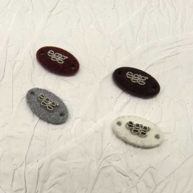 植绒米卡龙彩色 合金 有眼 纽扣 标牌字母椭圆扣针织衣 标吊|undefined