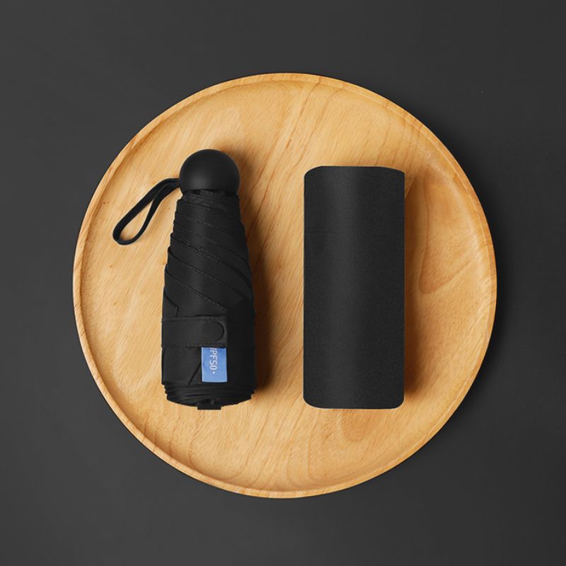 Paraguas de cinco pliegues, negro, protector solar, sombrilla ultraligera, cápsula plegable, sombrilla, sombrilla de bolsillo, sombrilla publicitaria, venta al por mayor personalizada