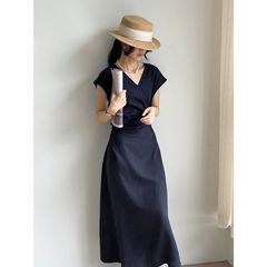 では、韓系天糸亜麻vネックのクロスストラップワンピースの女性の優しさが腰を収めて痩せているロングスカート5026