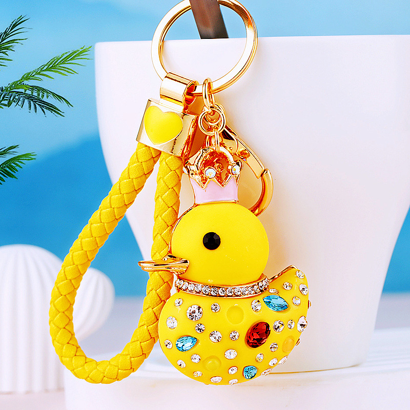 Diamond-embedded cute little yellow duck car keychain female Korean style bag pendant metal key chain ring creative gift wholesale
