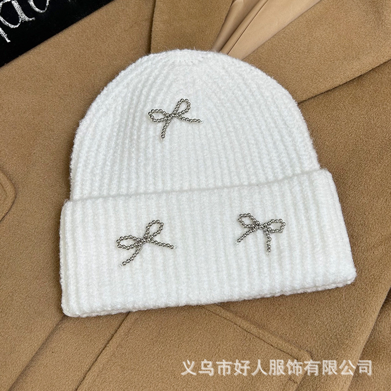 韓国版のファッションの新型の小さい香風の真珠の蝶結びの毛糸の帽子の大きい頭の周りの耳のメリヤスの冷たい帽子の頭の帽子の潮|undefined