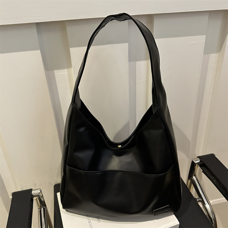 2024 nuevo estilo de moda extranjero estampado leopardo de gran capacidad bolsa de tote personalidad casual perezosa estilo de hombro bolso axilar