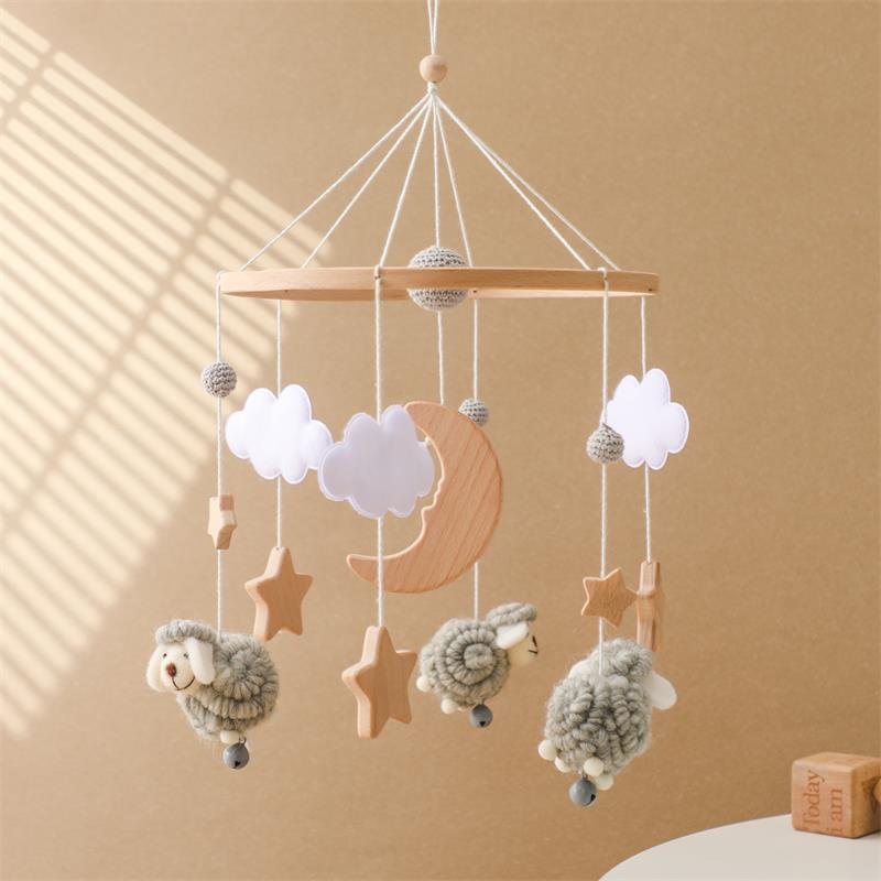 Decoración de la habitación de los niños de estilo nórdico cama colgante de viento carillones de madera anti-estrabismo mano-ojo coordinación estrella Luna ovejas cama Bell