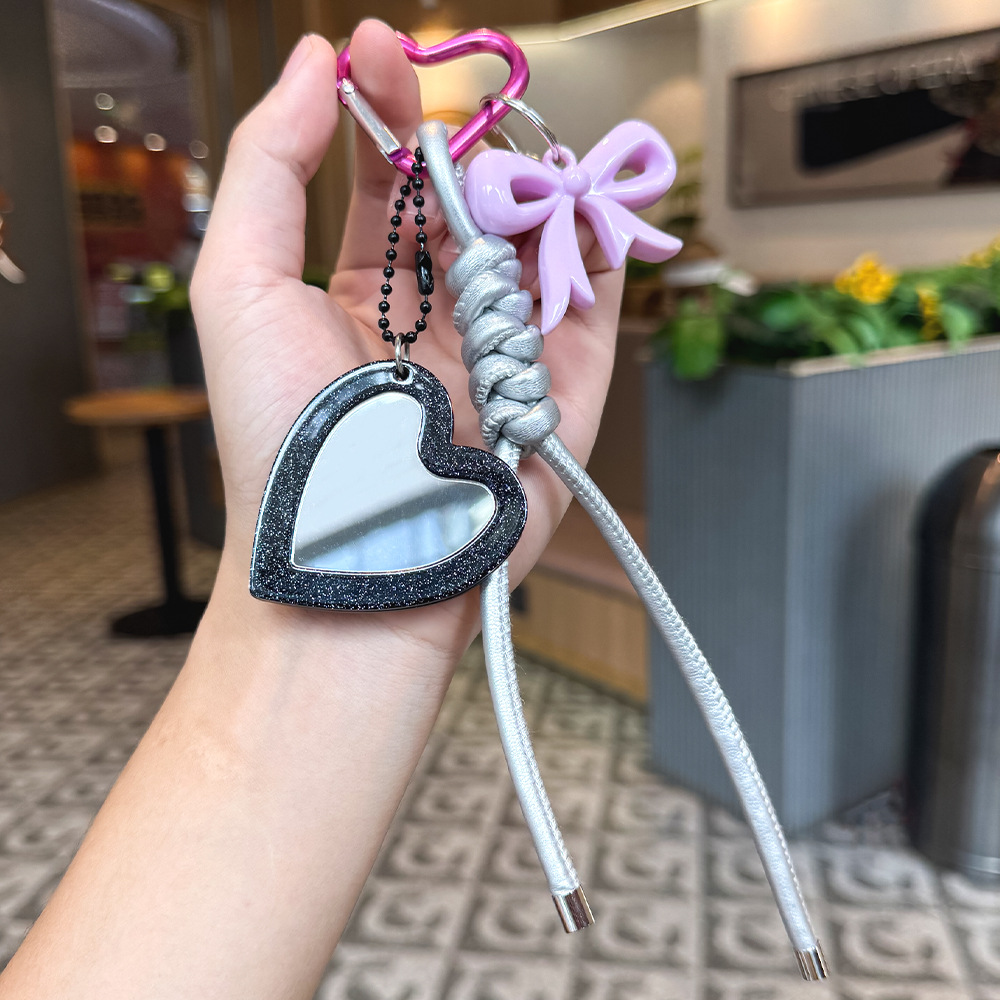 Nuevos productos transfronterizos creativos de letras de color cuerdas trenzadas llavero amor dibujos animados accesorios de diseño bolsos colgantes
