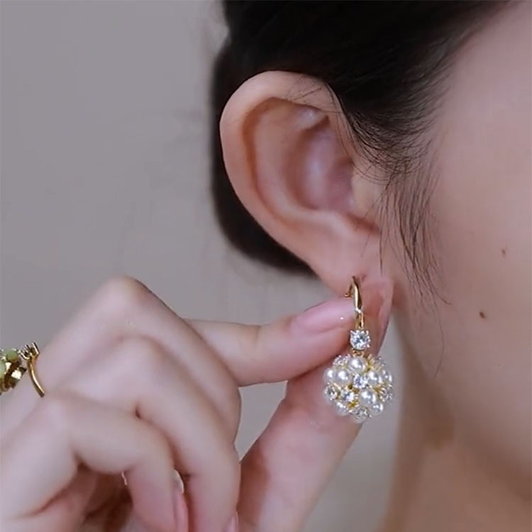 Design elegant fashionable sophisticated small earrings with zircon…
