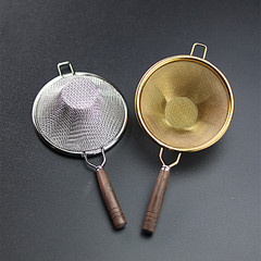 Creative Chinese-style stainless steel tea strainer with wooden handle, tea funnel, and gongdao cup tea separator – a perfect addition to your kung fu tea set!