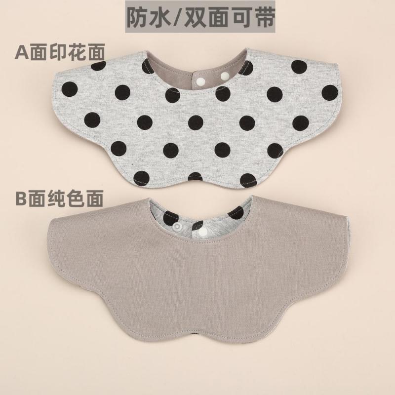 Ky waterproof model with floral gray background and black polka dots