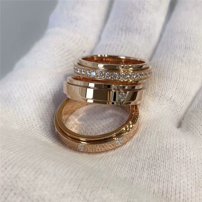 Кольцо V золото, позолота розовым золотом 18K и варианты из серебра, вращающийся круг с бриллиантом, один камень или 7 камней (размеры 5–10)